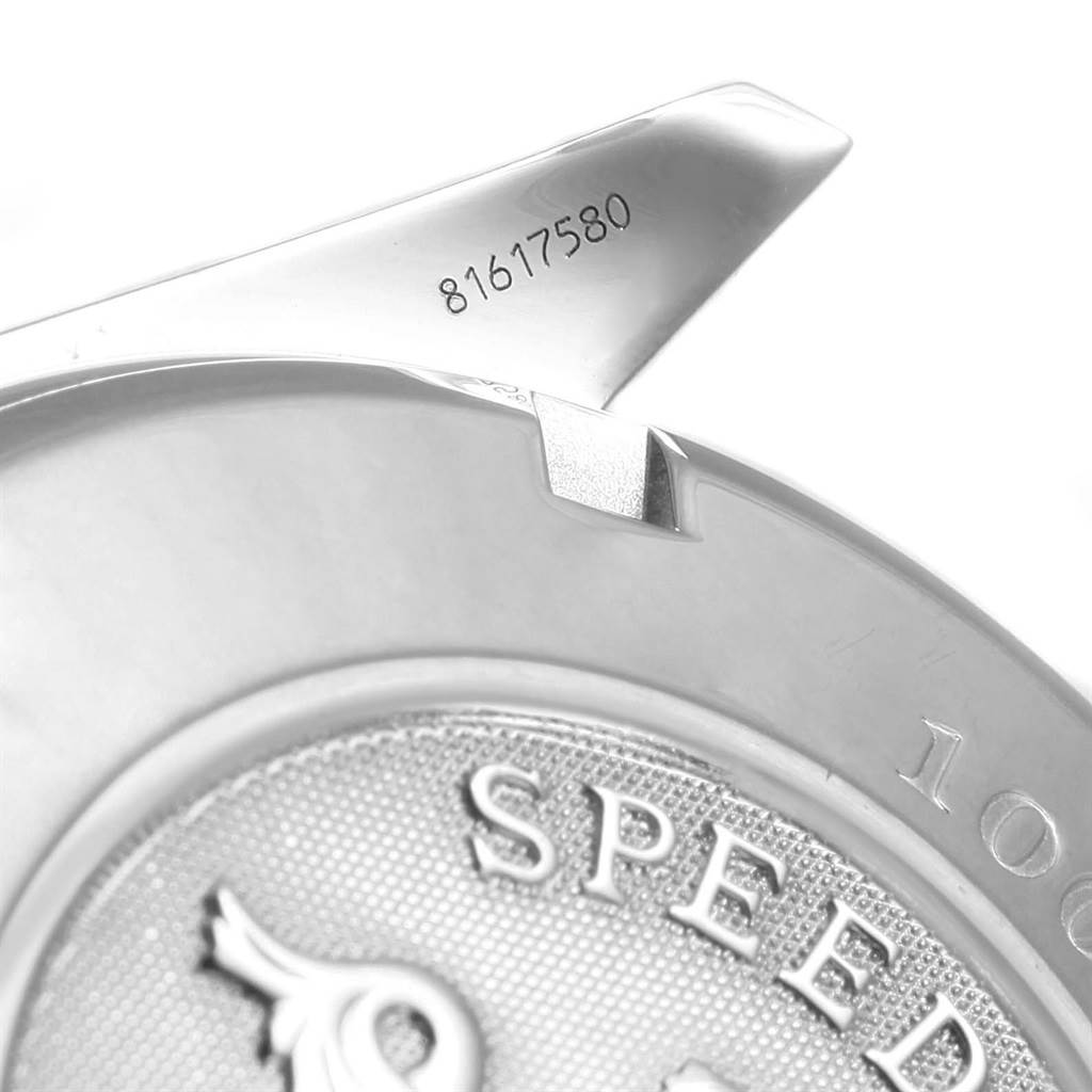 This image shows a partial view of the case back of an Omega Speedmaster 3212.80.00 Men
s Stainless Steel Blue Dial 3212.80.00 Men
s Stainless Steel Blue Dial watch, including the model name and part of the serial number.