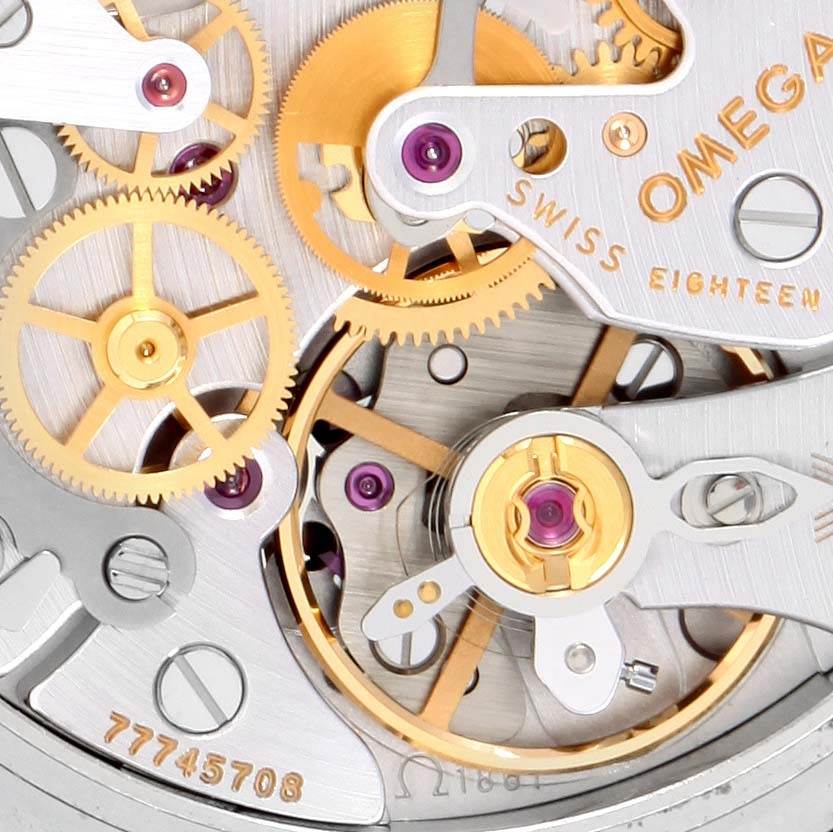 This is a close-up view of the Omega Speedmaster 3570.50.00 Men
s Stainless Steel Black Dial 3570.50.00 Men
s Stainless Steel Black Dial
s intricate movement and gear mechanism.