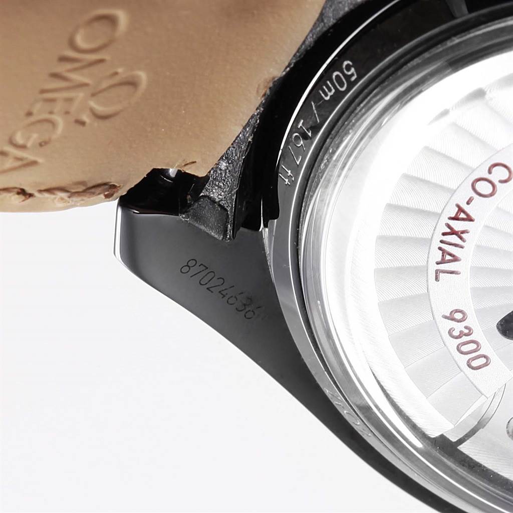 The image shows a close-up of the Omega Speedmaster 311.92.44.51.01.003 Men's Stainless Steel Black Dial 311.92.44.51.01.003 Men's Stainless Steel Black Dial's back case, partially revealing the movement and internal serial number.