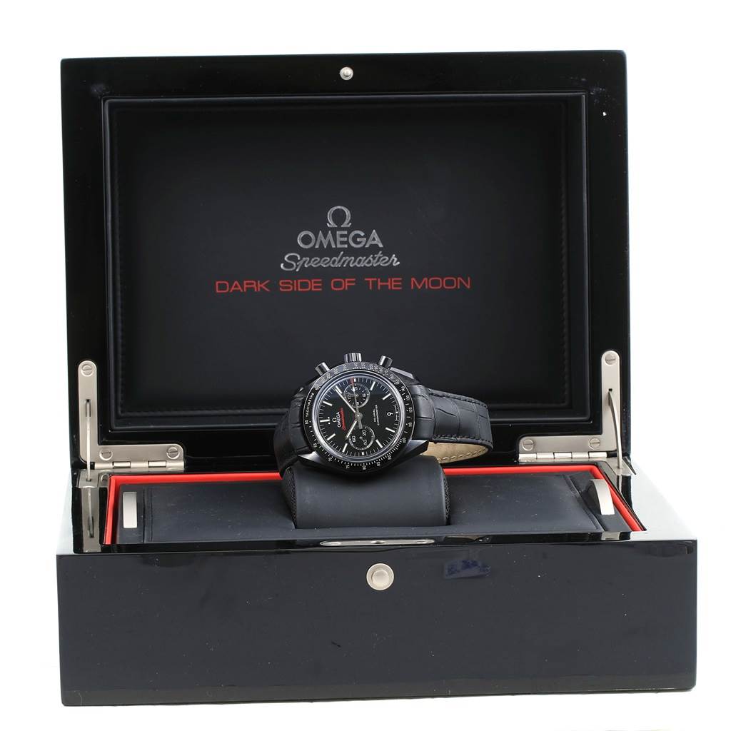 The Omega Speedmaster 311.92.44.51.01.003 Men's Stainless Steel Black Dial 311.92.44.51.01.003 Men's Stainless Steel Black Dial watch is displayed in an open box from a front angle, showing the case, dial, and leather strap.