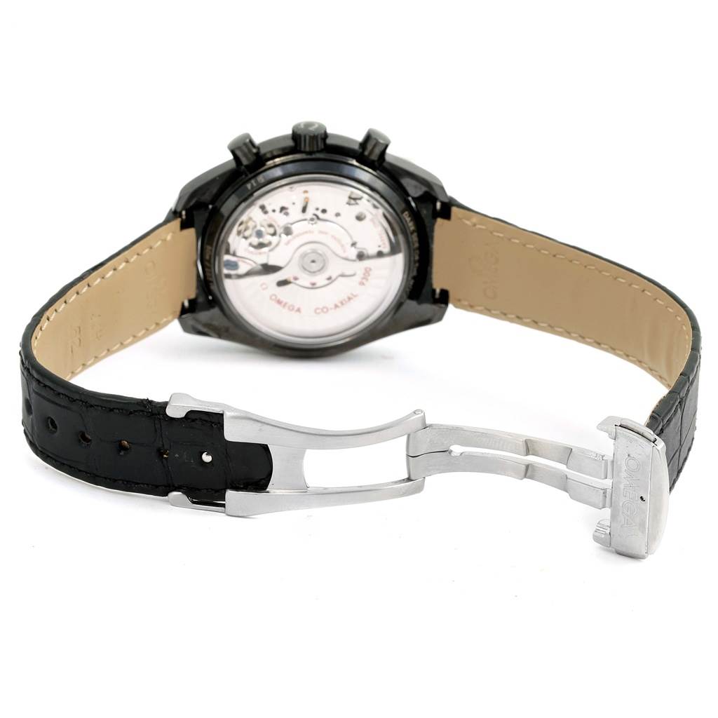 The image shows the back view of the Omega Speedmaster 311.92.44.51.01.003 Men's Stainless Steel Black Dial 311.92.44.51.01.003 Men's Stainless Steel Black Dial watch, displaying its open case back and black strap with a silver clasp.