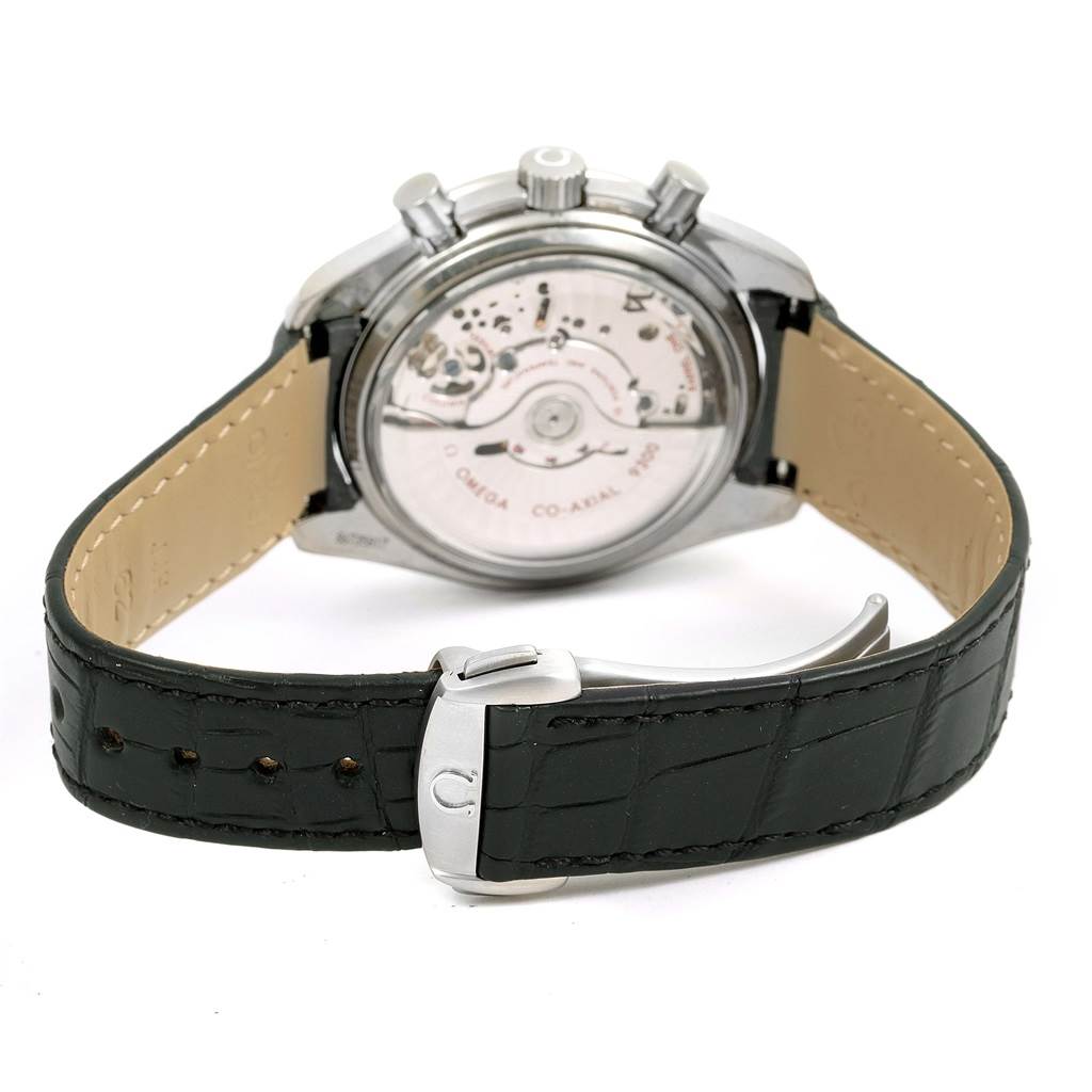 The Omega Speedmaster 311.93.44.51.99.001 Men
s Stainless Steel Silver Dial 311.93.44.51.99.001 Men
s Stainless Steel Silver Dial watch is shown from the rear, highlighting the transparent case back and visible movement, with a black leather strap and buckle.