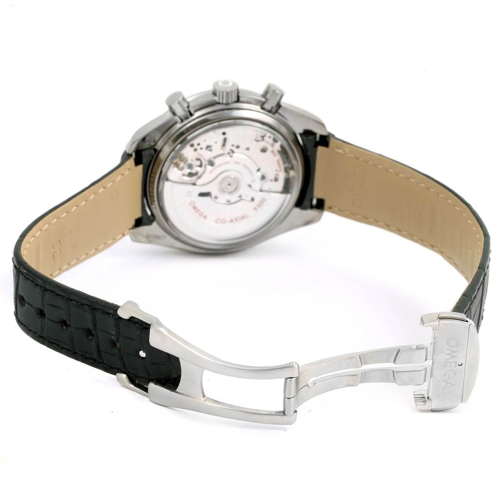 The image shows the back view of an Omega Speedmaster 311.93.44.51.99.001 Men
s Stainless Steel Silver Dial 311.93.44.51.99.001 Men
s Stainless Steel Silver Dial watch, highlighting the movement and the leather strap with a clasp.