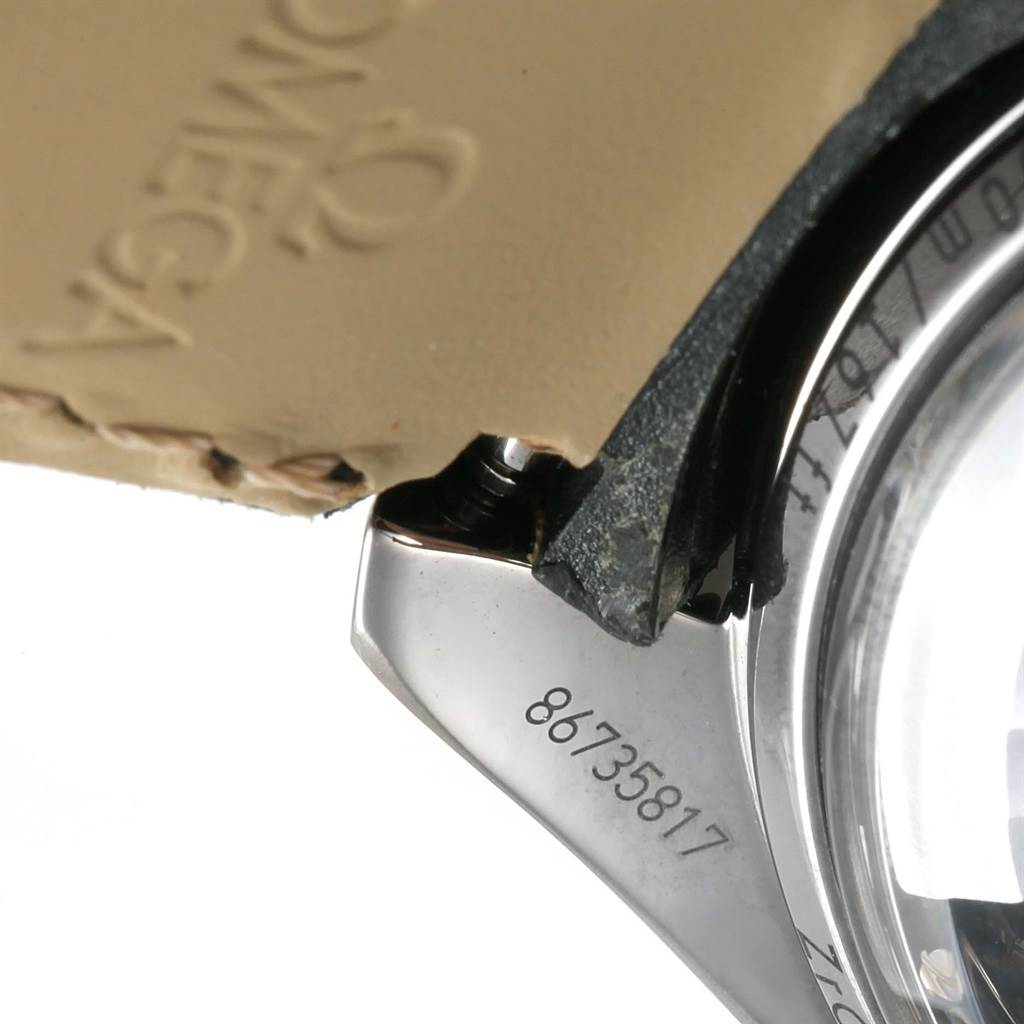 This close-up shows part of the Omega Speedmaster 311.93.44.51.99.001 Men
s Stainless Steel Silver Dial 311.93.44.51.99.001 Men
s Stainless Steel Silver Dial watch case and strap, including the lug with a visible serial number.