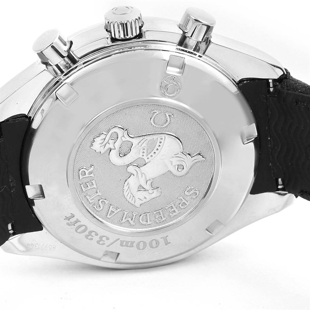 The image shows the back case and crown of the Omega Speedmaster 323.32.40.40.04.001 Men
s Stainless Steel White Dial 323.32.40.40.04.001 Men
s Stainless Steel White Dial watch, including the engraved logo and text.