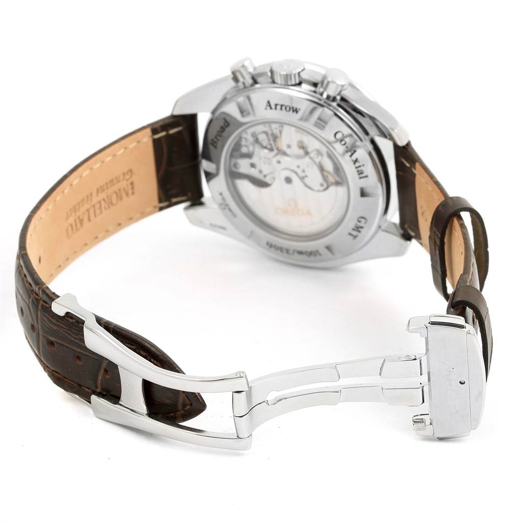 The image shows the back view of the Omega Speedmaster 3881.30.37 Men
s Stainless Steel Silver Dial 3881.30.37 Men
s Stainless Steel Silver Dial watch displaying its open case back and leather strap with clasp.