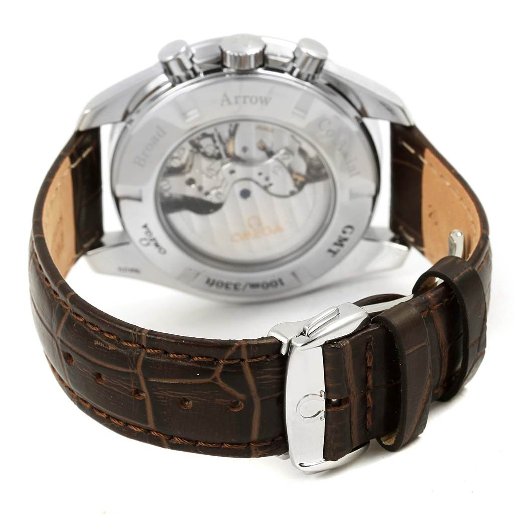 The image shows the rear view of an Omega Speedmaster 3881.30.37 Men
s Stainless Steel Silver Dial 3881.30.37 Men
s Stainless Steel Silver Dial watch, highlighting its transparent case back and leather strap with a buckle.