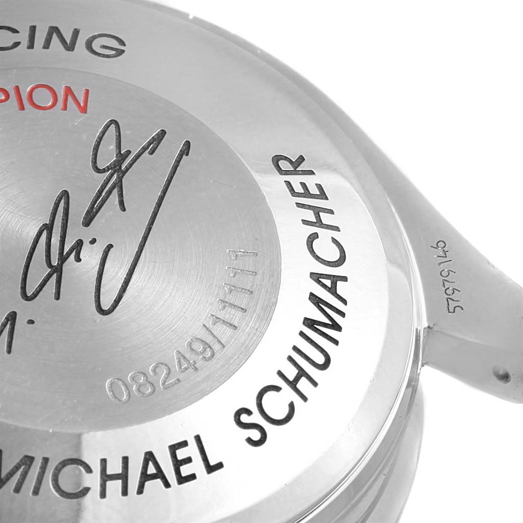 This image shows the back casing of an Omega Speedmaster 3519.50.00 Men
s Stainless Steel Black Dial 3519.50.00 Men
s Stainless Steel Black Dial watch, featuring Michael Schumacher
s name and a limited edition number.