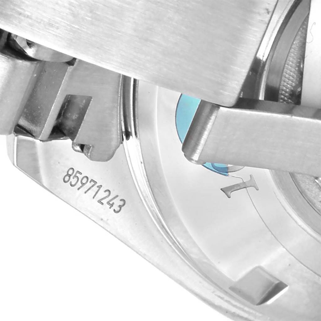 The image shows a close-up of the clasp and part of the back case of an Omega Speedmaster 323.30.40.40.06.001 Men
s Stainless Steel Grey Dial 323.30.40.40.06.001 Men
s Stainless Steel Grey Dial watch.