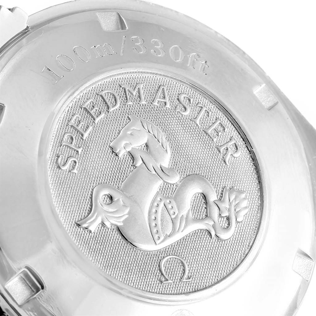 The image shows the back case of an Omega Speedmaster 3220.50.00 Men
s Stainless Steel Black Dial 3220.50.00 Men
s Stainless Steel Black Dial watch, featuring its emblem and water resistance rating of 100m/330ft.