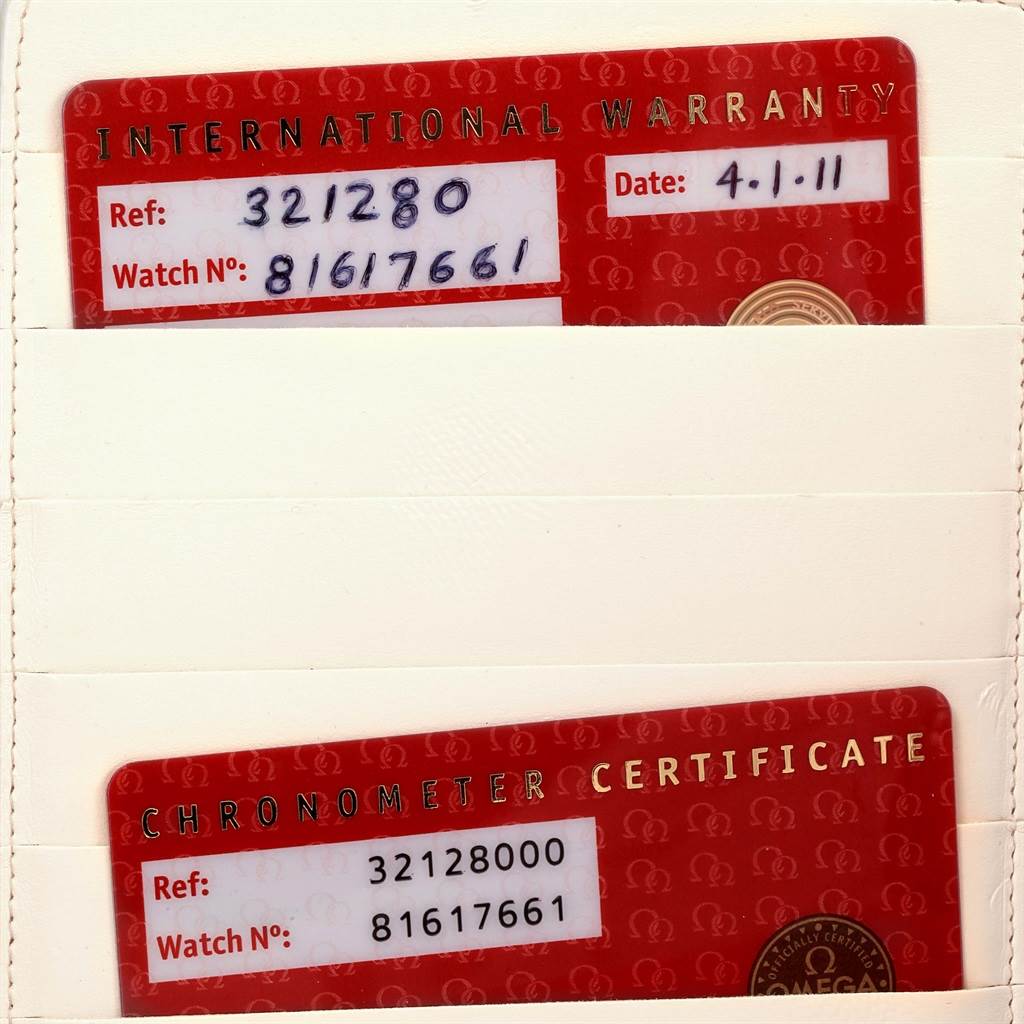 The image shows the International Warranty and Chronometer Certificate cards for an Omega Speedmaster 3212.80.00 Men
s Stainless Steel Blue Dial 3212.80.00 Men
s Stainless Steel Blue Dial watch.