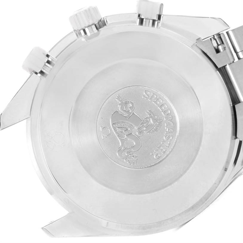 This image shows the back case and side view of the Omega Speedmaster 3539.50.00 Men
s Stainless Steel Black Dial 3539.50.00 Men
s Stainless Steel Black Dial watch, featuring the engraved design and pushers.