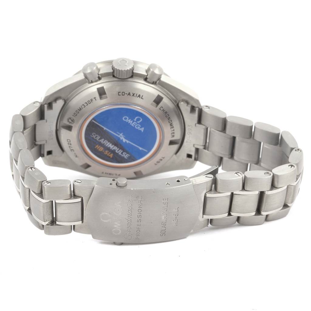 The image shows the back and bracelet of an Omega Speedmaster 321.90.44.52.01.001 Men's Titanium Black Dial 321.90.44.52.01.001 Men's Titanium Black Dial watch, highlighting the case back and clasp details.