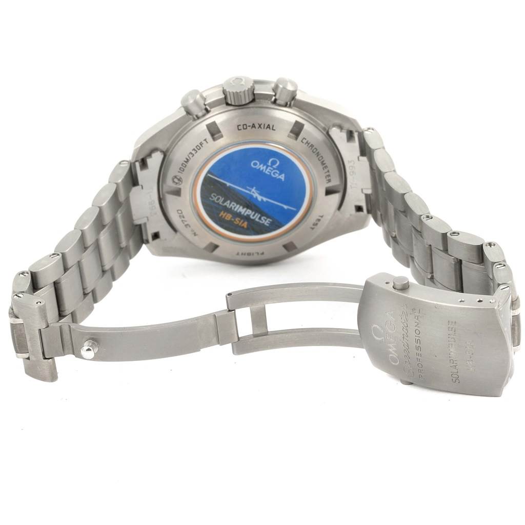 The image shows the back and clasp of an Omega Speedmaster 321.90.44.52.01.001 Men's Titanium Black Dial 321.90.44.52.01.001 Men's Titanium Black Dial watch, highlighting the bracelet and case back details.