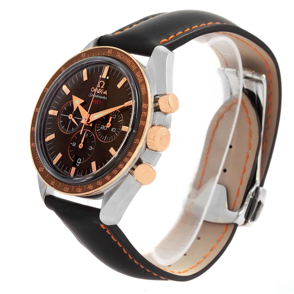 The Omega Speedmaster 321.93.42.50.13.001 Men
s Steel and Gold (two tone) Brown Dial 321.93.42.50.13.001 Men
s Steel and Gold (two tone) Brown Dial watch is shown at a three-quarter angle, highlighting the face, bezel, pushers, and strap.