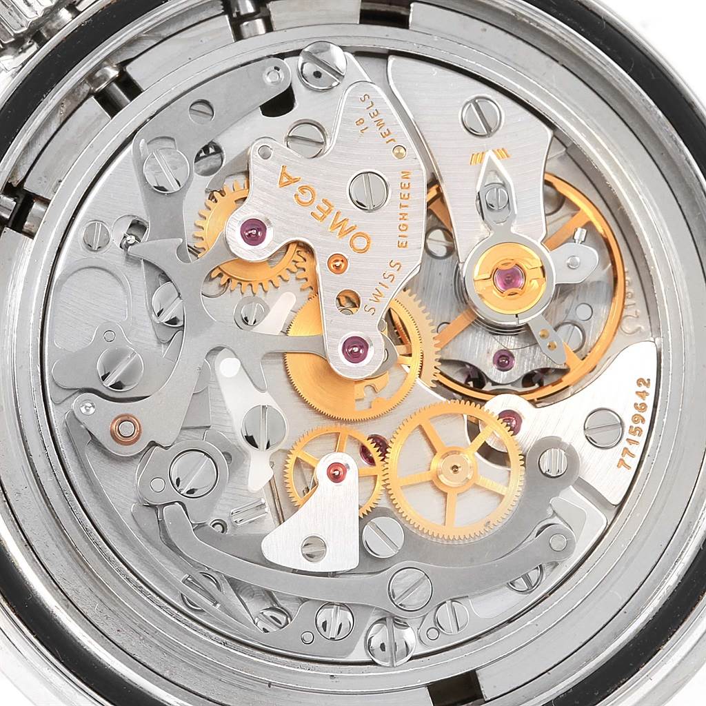 The image shows the intricate internal mechanics of the Omega Speedmaster 3577.50.00 Men's Stainless Steel Black Dial 3577.50.00 Men's Stainless Steel Black Dial watch, focusing on gears and movements from a back angle.