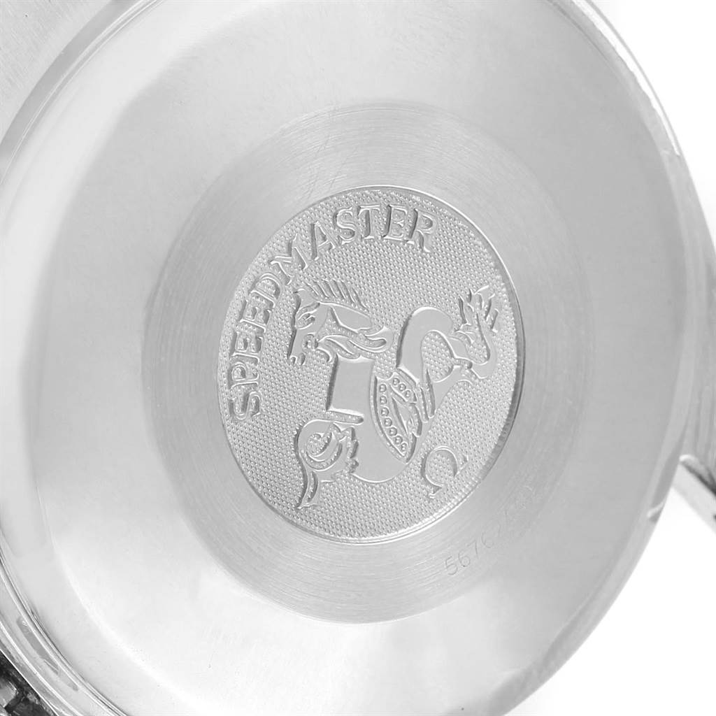 The image shows the back case of an Omega Speedmaster 3523.80.00 Men
s Stainless Steel Blue Dial 3523.80.00 Men
s Stainless Steel Blue Dial watch, highlighting the engraved emblem and text.