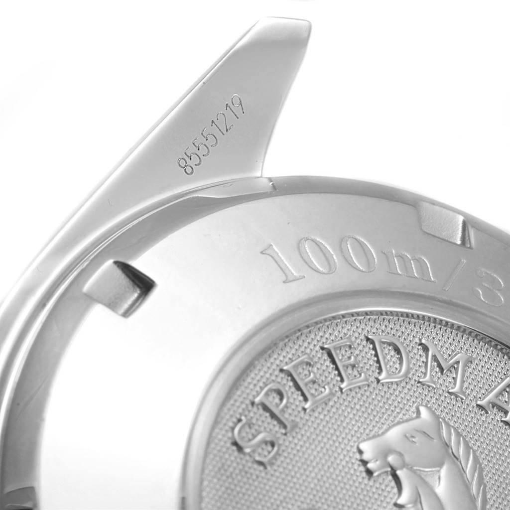 The image shows the back case of an Omega Speedmaster 3211.31.00 Men
s Stainless Steel Silver Dial 3211.31.00 Men
s Stainless Steel Silver Dial watch, highlighting the model
s engraving and water resistance.