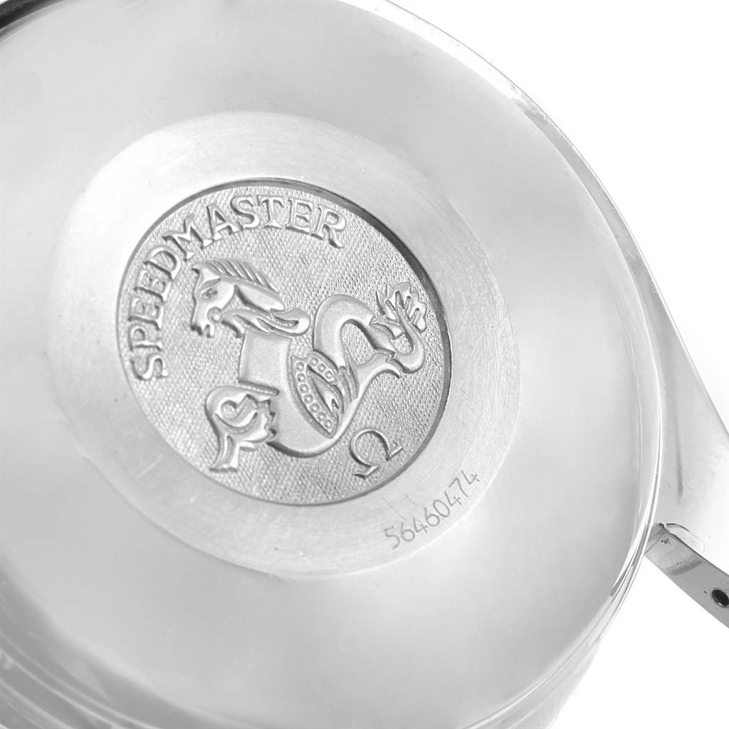 This is a close-up view of the case back of the Omega Speedmaster 3523.80.00 Men
s Stainless Steel Blue Dial 3523.80.00 Men
s Stainless Steel Blue Dial watch, showing the engraved logo and serial number.