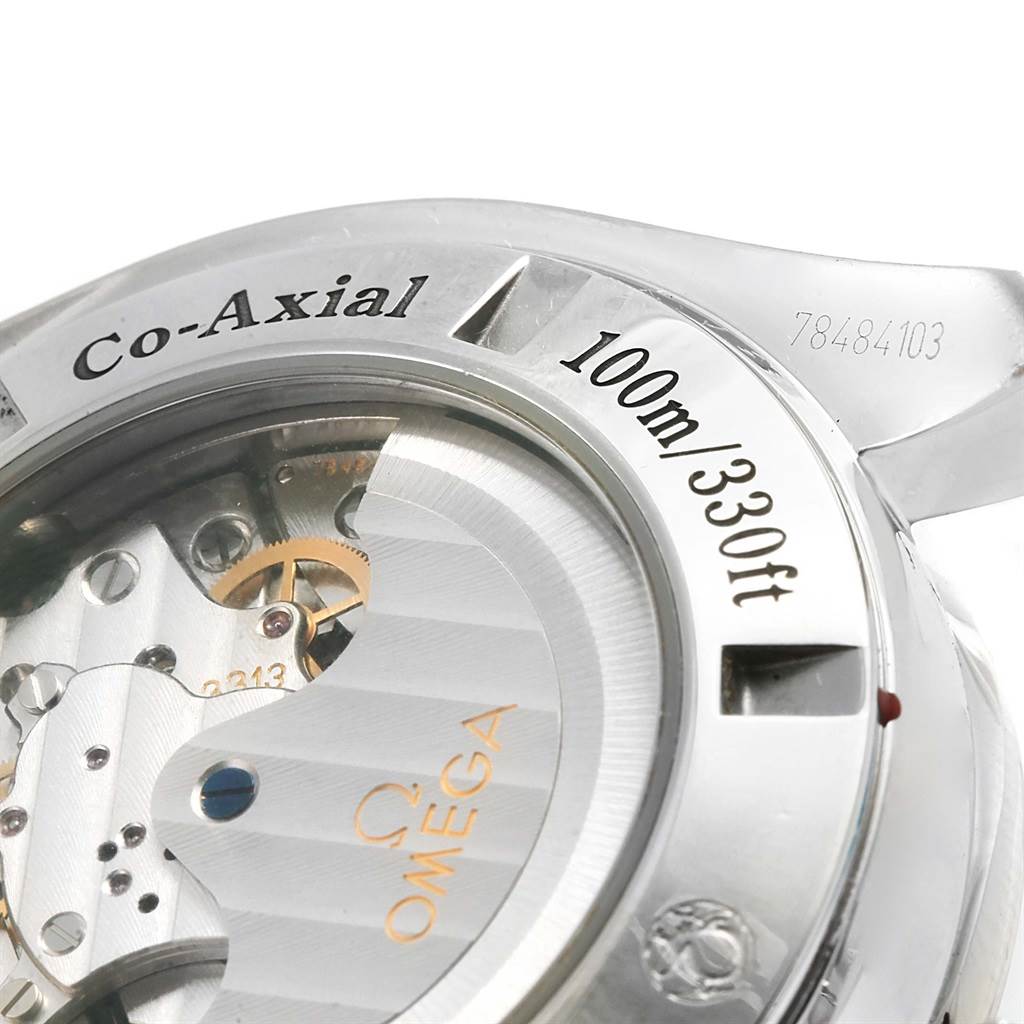 The image shows the back view of the Omega Speedmaster 321.10.44.50.02.001 Men's Stainless Steel Silver Dial 321.10.44.50.02.001 Men's Stainless Steel Silver Dial watch, highlighting the co-axial movement and water resistance markings.