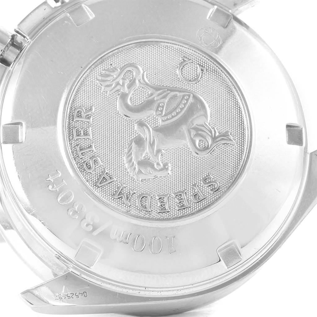 The image shows the case back of an Omega Speedmaster 3220.50.00 Men
s Stainless Steel Black Dial 3220.50.00 Men
s Stainless Steel Black Dial watch at a slight angle.