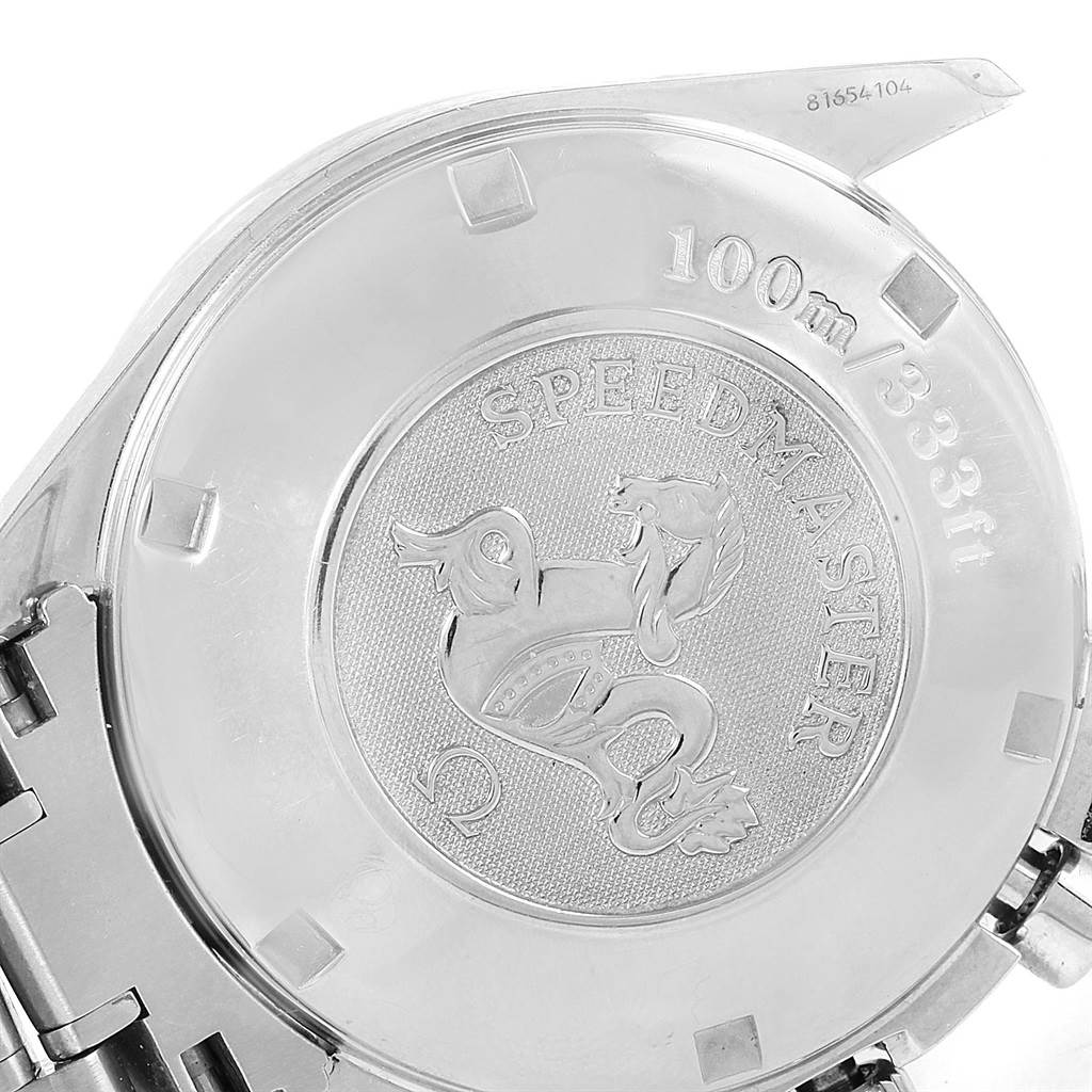 The image shows the back case of an Omega Speedmaster 3210.52.00 Men
s Stainless Steel Black Dial 3210.52.00 Men
s Stainless Steel Black Dial watch featuring its emblem and water resistance details.