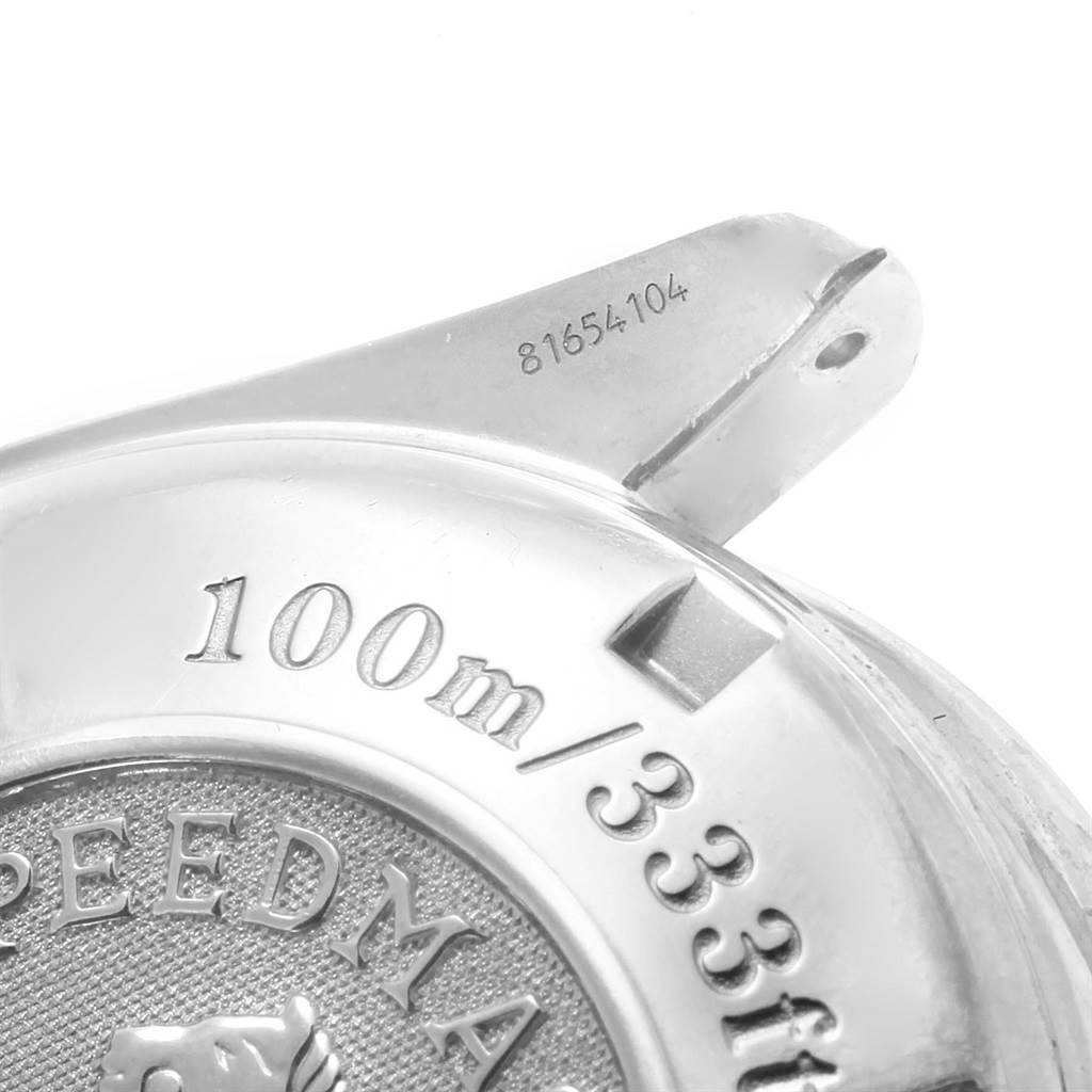 The image shows the back case and lug of an Omega Speedmaster 3210.52.00 Men
s Stainless Steel Black Dial 3210.52.00 Men
s Stainless Steel Black Dial watch, highlighting the depth rating and partial serial number.