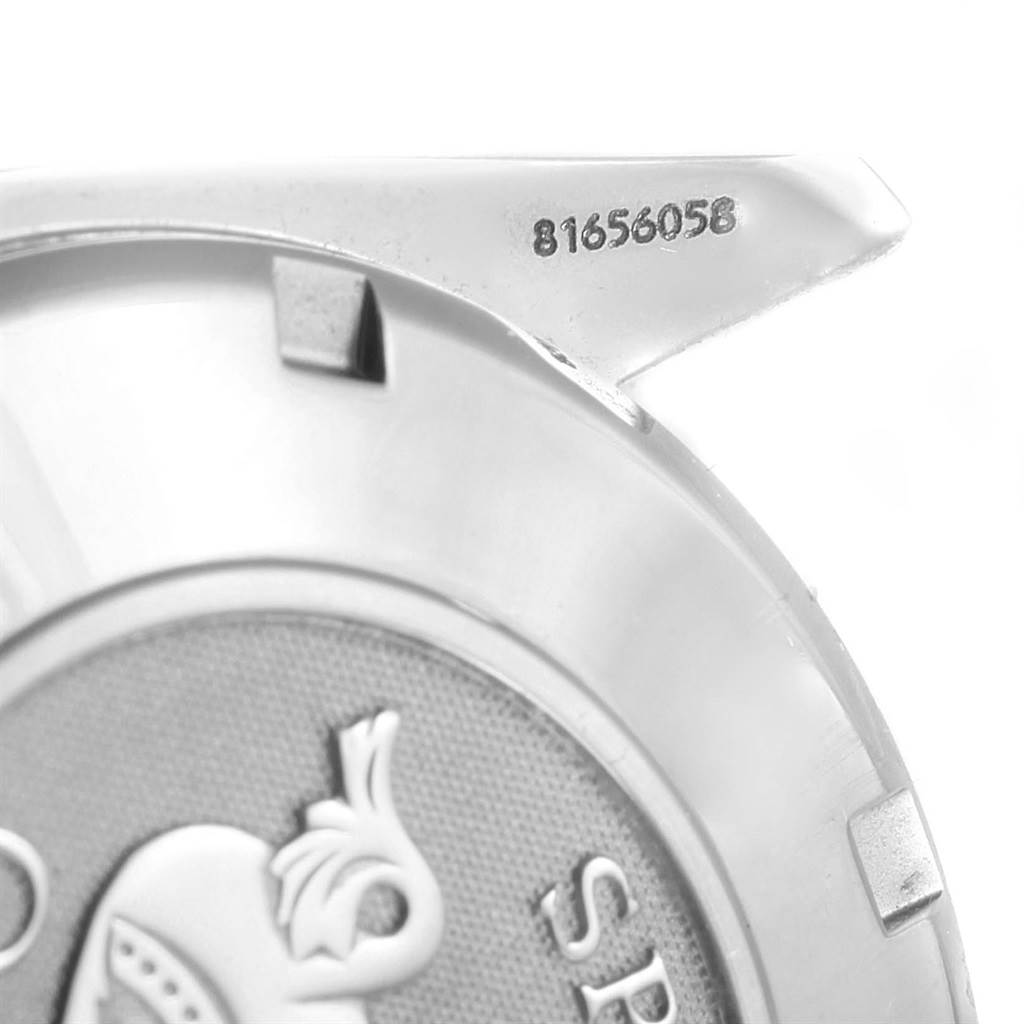 This close-up image shows the back case and serial number of an Omega Speedmaster 3210.51.00 Men
s Stainless Steel Black Dial 3210.51.00 Men
s Stainless Steel Black Dial watch.