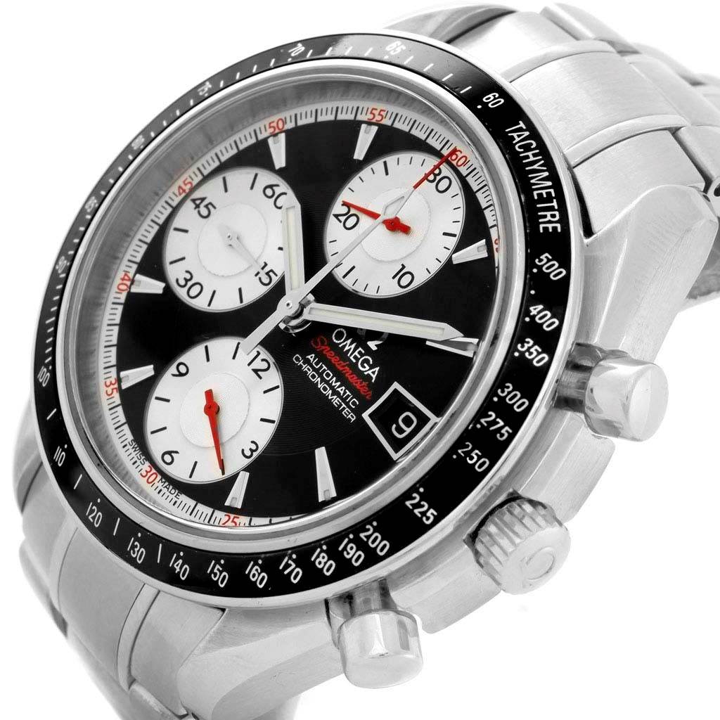 The image shows an angled view of the Omega Speedmaster 3210.51.00 Men
s Stainless Steel Black Dial 3210.51.00 Men
s Stainless Steel Black Dial watch, displaying its dial, bezel, crown, pushers, and bracelet.