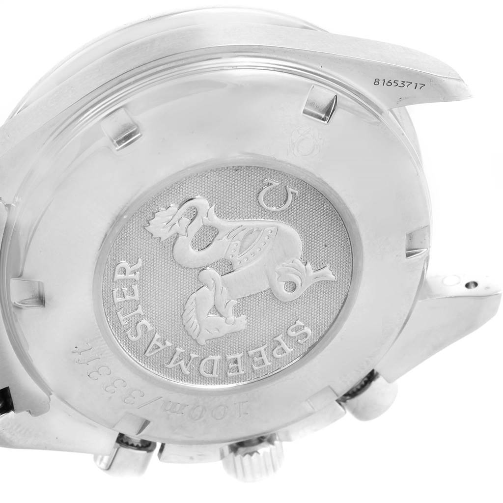 The image shows the case back of an Omega Speedmaster 3210.50.00 Men
s Stainless Steel Black Dial 3210.50.00 Men
s Stainless Steel Black Dial watch at an angled close-up view.