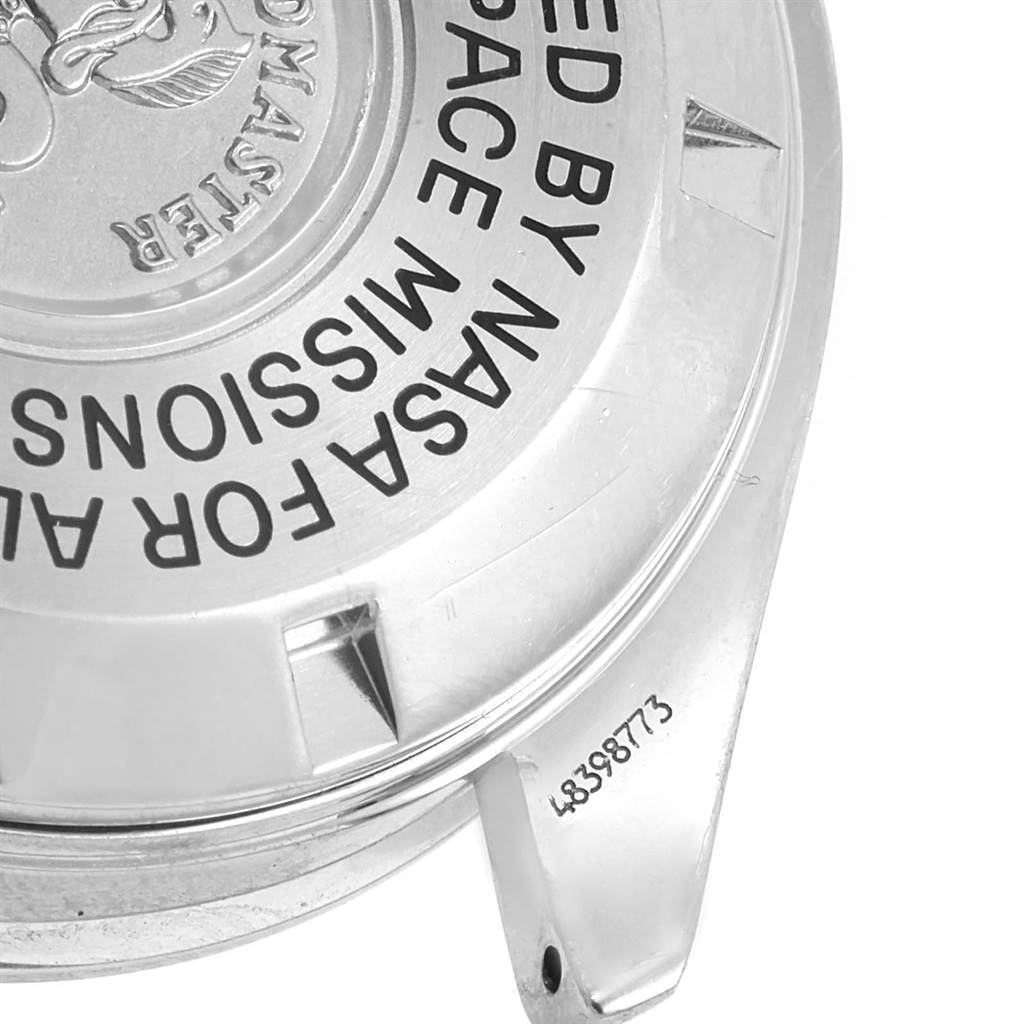 The image shows the case back of an Omega Speedmaster 3570.50.00 Men
s Stainless Steel Black Dial 3570.50.00 Men
s Stainless Steel Black Dial watch, with its engraved text and serial number clearly visible.