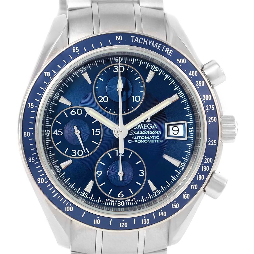 The image shows the face of an Omega Speedmaster 3212.80.00 Men
s Stainless Steel Blue Dial 3212.80.00 Men
s Stainless Steel Blue Dial watch, with its blue dial, tachymeter bezel, chronograph sub-dials, and date window.