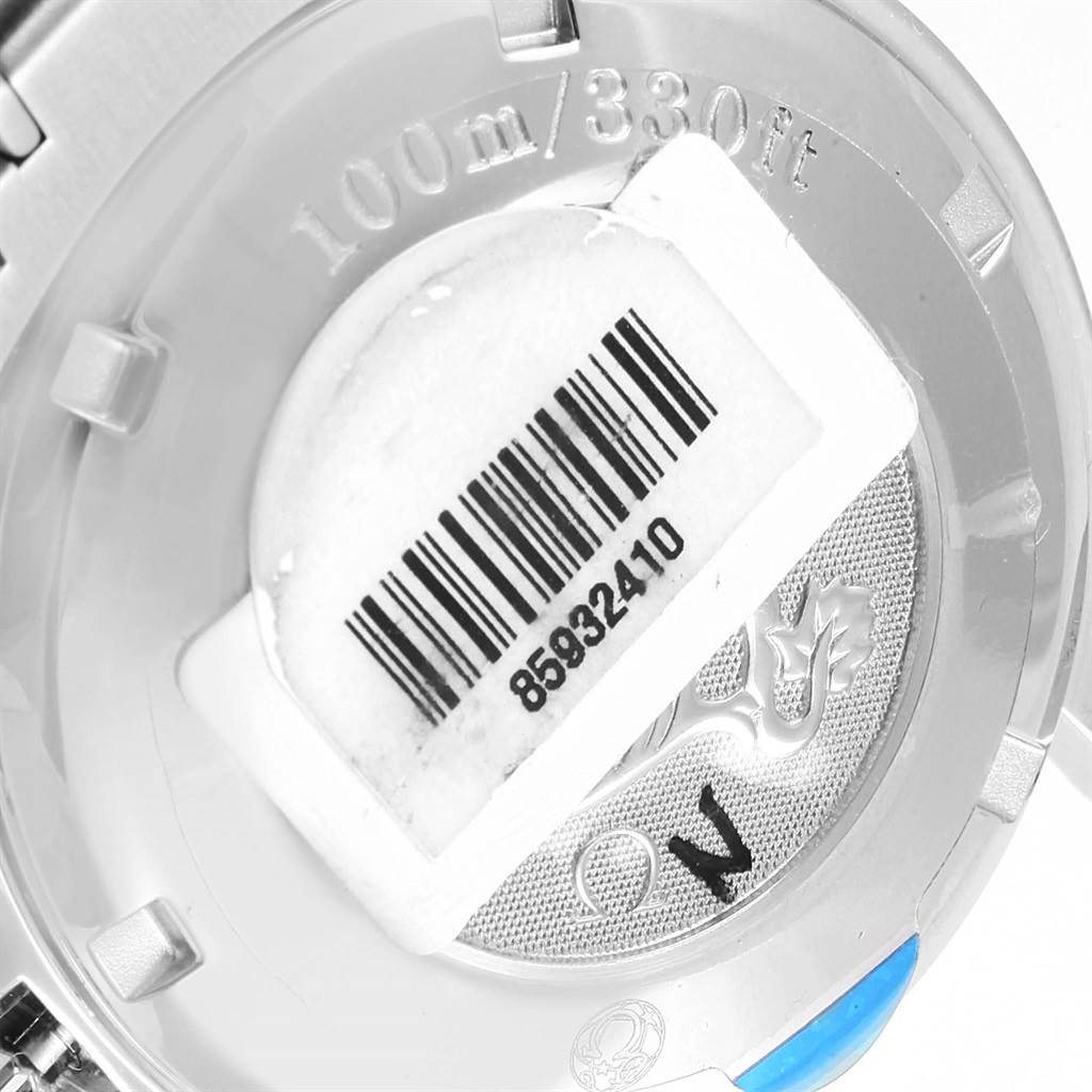 The image shows the case back of an Omega Speedmaster 3220.50.00 Men
s Stainless Steel Black Dial 3220.50.00 Men
s Stainless Steel Black Dial watch, featuring a barcode sticker and water resistance engraving.