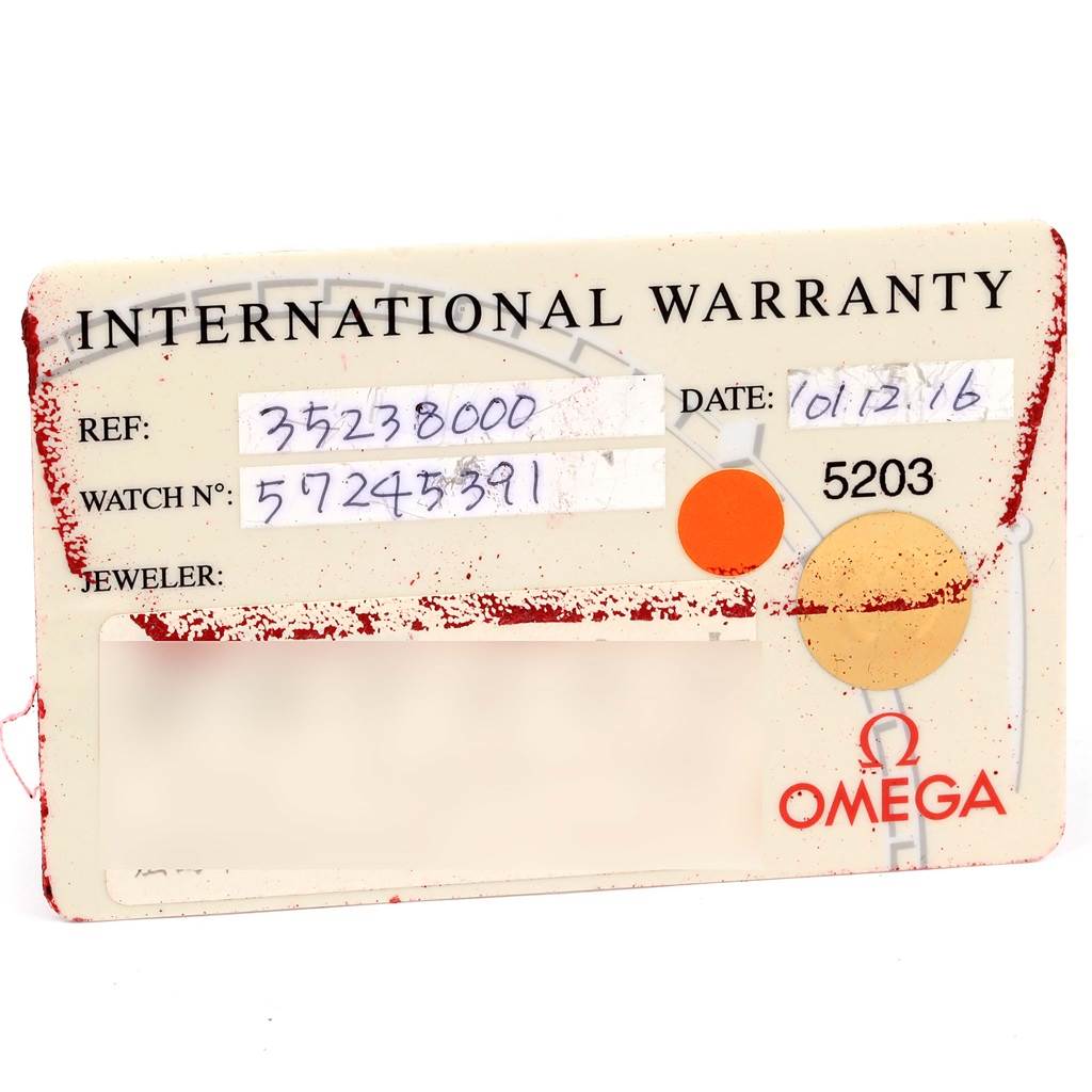 An Omega Speedmaster 3523.80.00 Men's Stainless Steel Blue Dial 3523.80.00 Men's Stainless Steel Blue Dial International Warranty card is shown from a front angle.