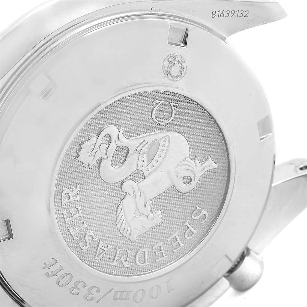 This image shows the case back of an Omega Speedmaster 3210.52.00 Men
s Stainless Steel Black Dial 3210.52.00 Men
s Stainless Steel Black Dial watch, highlighting the engraved emblem and text.