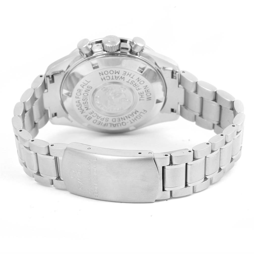 The image shows the back case and bracelet of an Omega Speedmaster 3570.50.00 Men
s Stainless Steel Black Dial 3570.50.00 Men
s Stainless Steel Black Dial watch at an angle displaying the case back engraving.