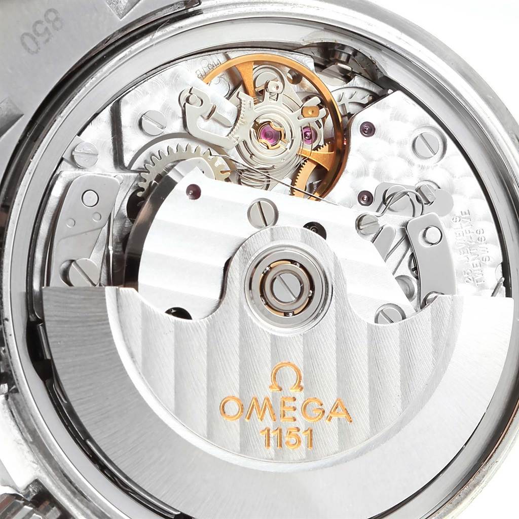 The image shows an up-close view of the Omega Speedmaster 3520.50.00 Men
s Stainless Steel Black Dial 3520.50.00 Men
s Stainless Steel Black Dial 1151 movement through the watch
s caseback.