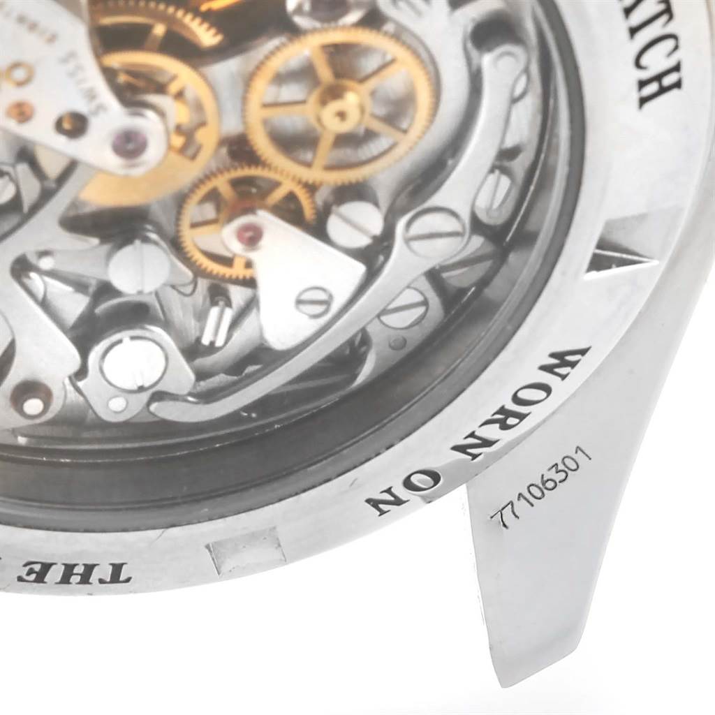 The image shows the internal mechanical movement and part of the casing of an Omega Speedmaster 3573.50.00 Men's Stainless Steel Black Dial 3573.50.00 Men's Stainless Steel Black Dial watch from a close-up angle.