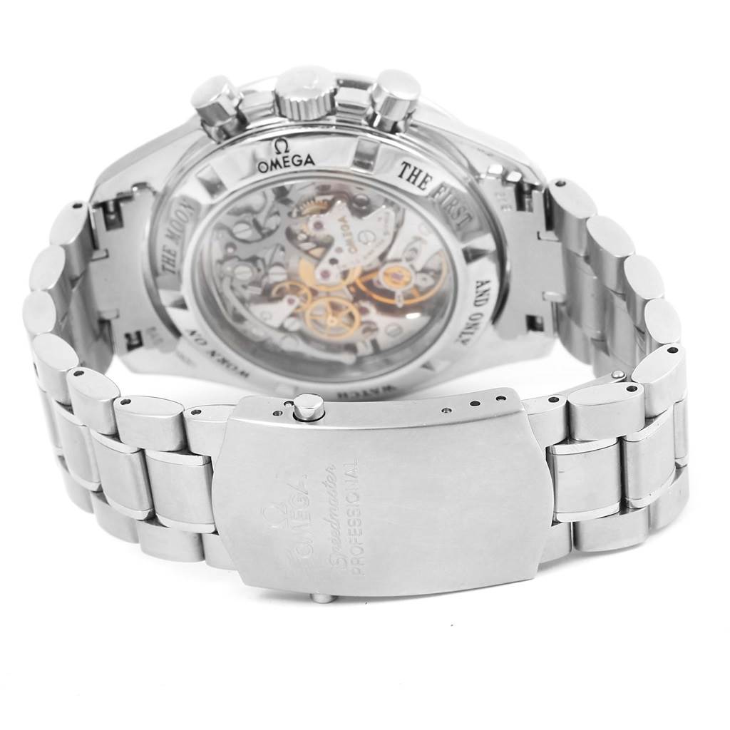 The image shows the back view of an Omega Speedmaster 3573.50.00 Men's Stainless Steel Black Dial 3573.50.00 Men's Stainless Steel Black Dial watch, highlighting its transparent case back and metal bracelet with clasp.