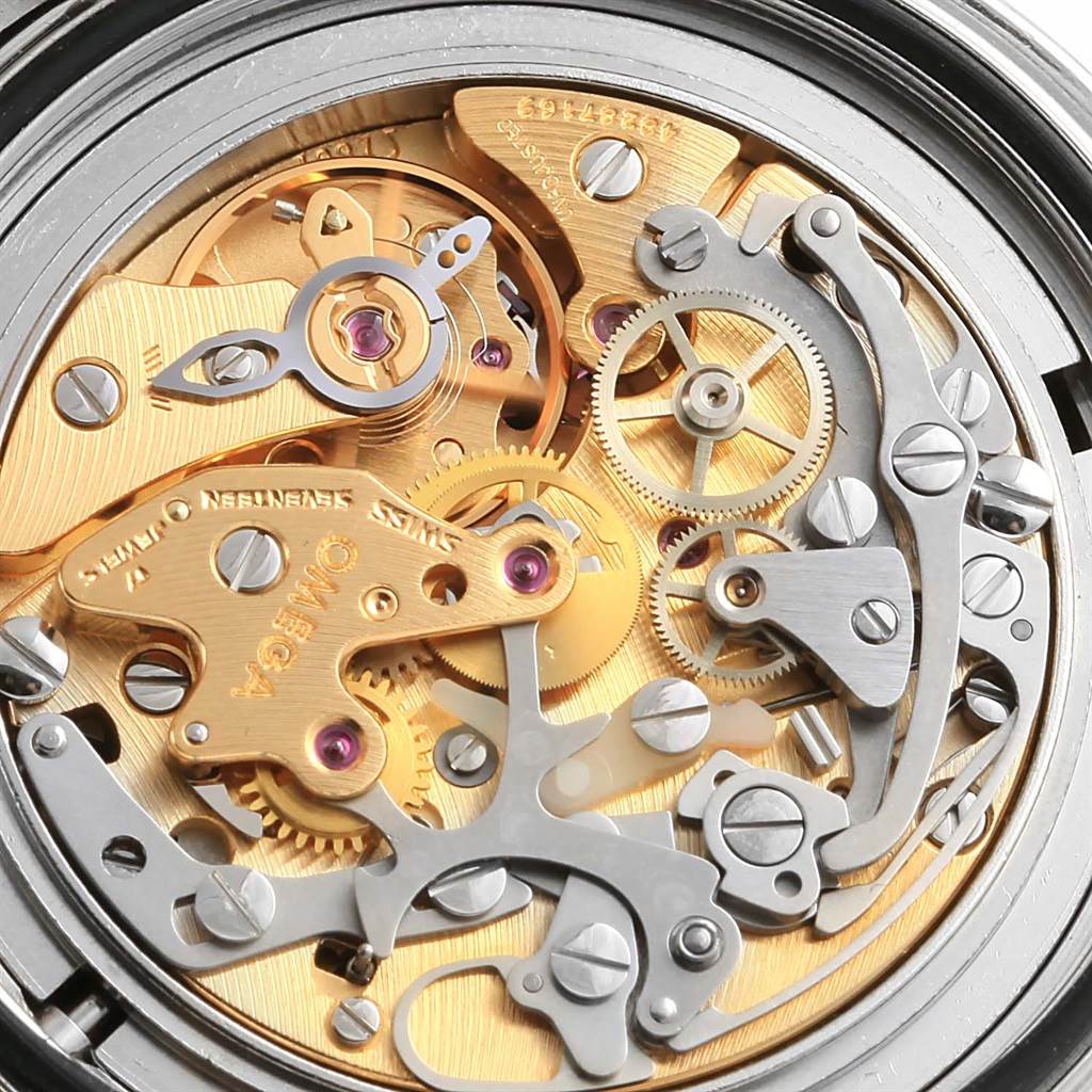 This image shows a close-up of the Omega Speedmaster Men
s Stainless Steel Black Dial Men
s Stainless Steel Black Dial watch
s movement with visible gears and mechanisms.
