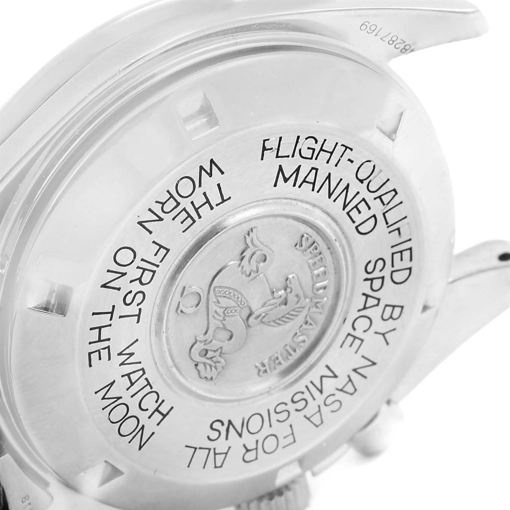 The image shows the back case of an Omega Speedmaster Men
s Stainless Steel Black Dial Men
s Stainless Steel Black Dial watch, displaying engraved text and logo.