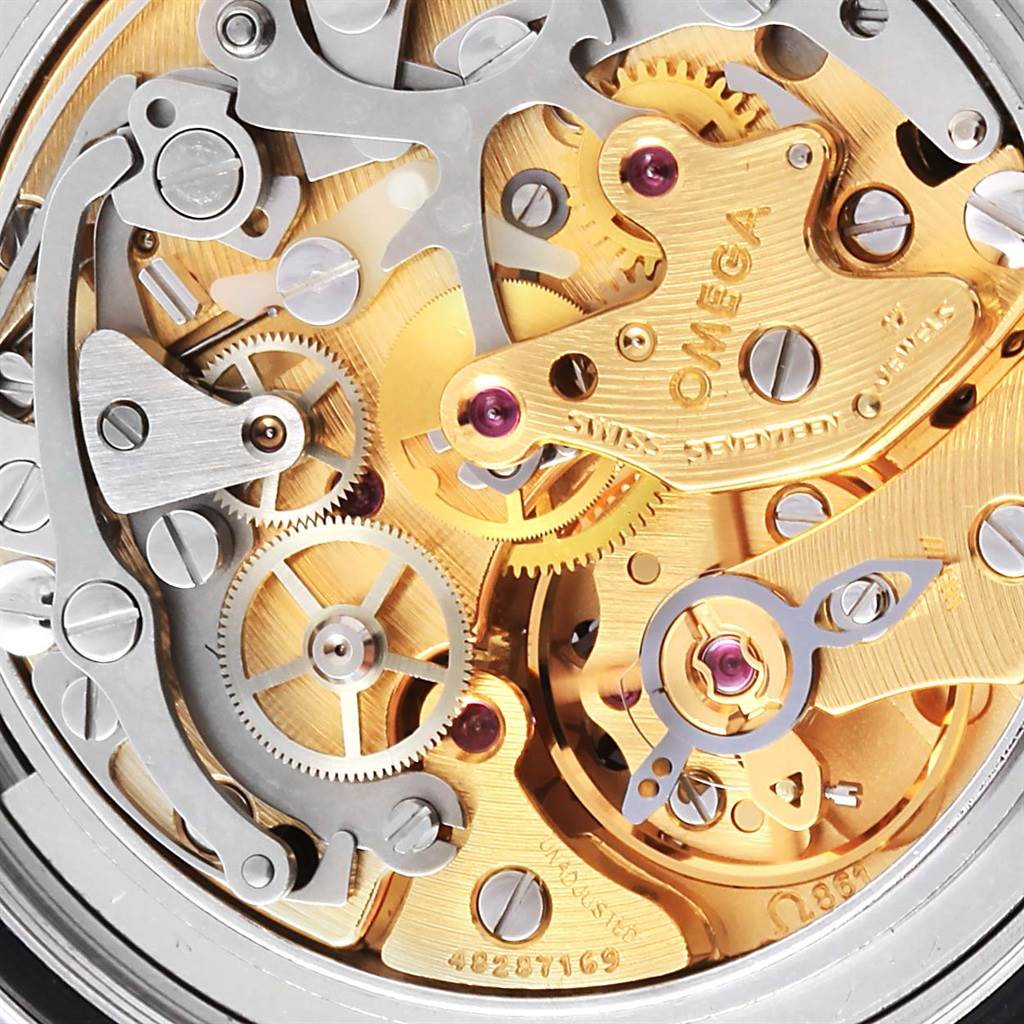 This is a close-up view of the intricate gears and mechanisms inside an Omega Speedmaster Men
s Stainless Steel Black Dial Men
s Stainless Steel Black Dial watch.