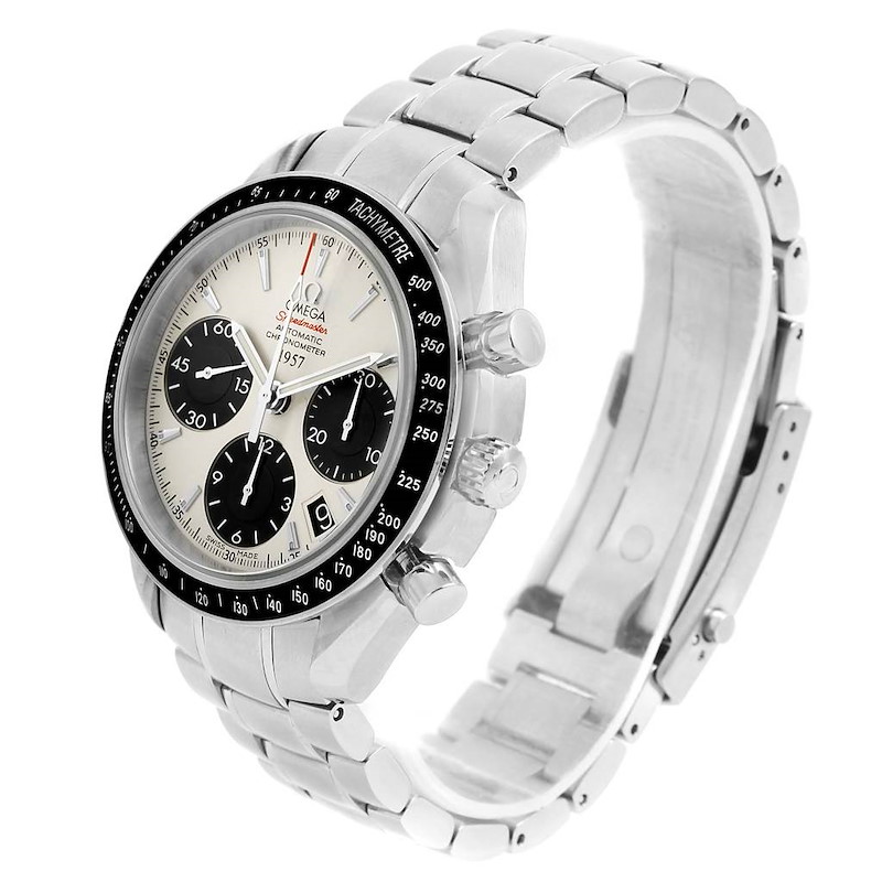 The Omega Speedmaster watch is shown from a side-angle view displaying the dial, bezel, chronograph buttons, and bracelet.