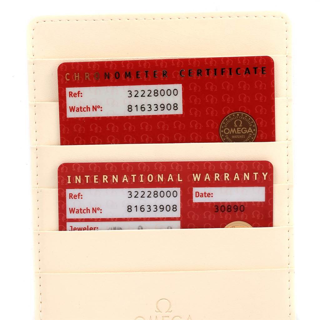 This image shows the chronometer certificate and international warranty cards for the Omega Speedmaster 3222.80.00 Men
s Stainless Steel Blue Dial 3222.80.00 Men
s Stainless Steel Blue Dial watch.