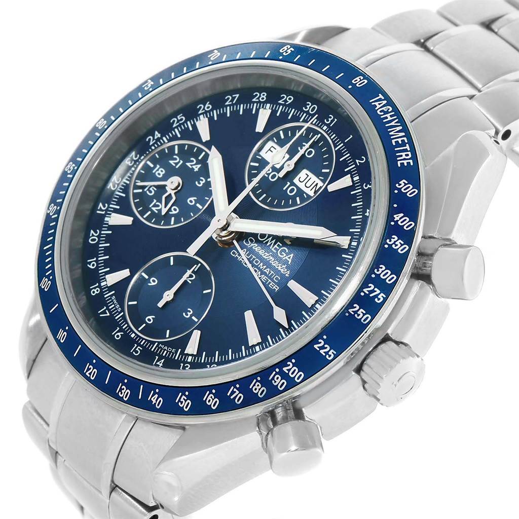 The image shows a close-up of an Omega Speedmaster 3222.80.00 Men
s Stainless Steel Blue Dial 3222.80.00 Men
s Stainless Steel Blue Dial watch, highlighting its blue dial, sub-dials, tachymeter bezel, and stainless steel bracelet.