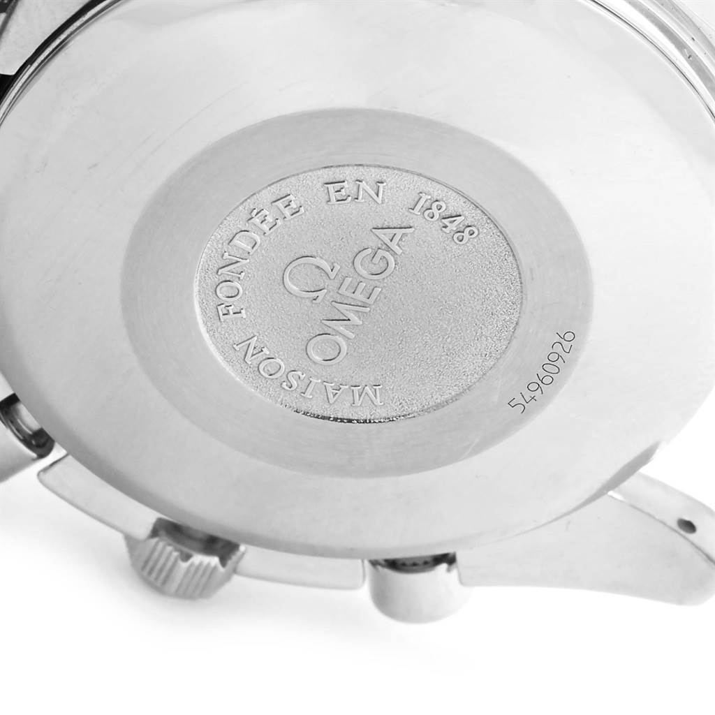 This image shows the back case of the Omega Speedmaster 3521.30.00 Men
s Stainless Steel Silver Dial 3521.30.00 Men
s Stainless Steel Silver Dial watch, emphasizing the engraved logo and text.