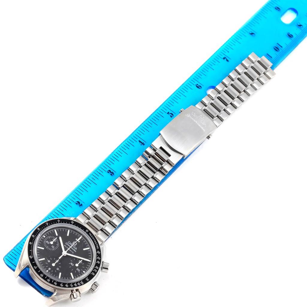 The Omega Speedmaster 3539.50.00 Men
s Stainless Steel Black Dial 3539.50.00 Men
s Stainless Steel Black Dial watch is shown flat, with a ruler measuring its full length, including the bracelet and clasp.