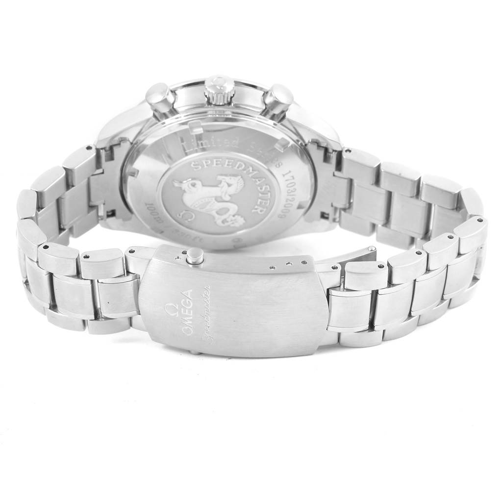 The image shows the back of an Omega Speedmaster 323.30.40.40.01.001 Men's Stainless Steel Black Dial 323.30.40.40.01.001 Men's Stainless Steel Black Dial watch, focusing on the case back and the metal bracelet clasp.