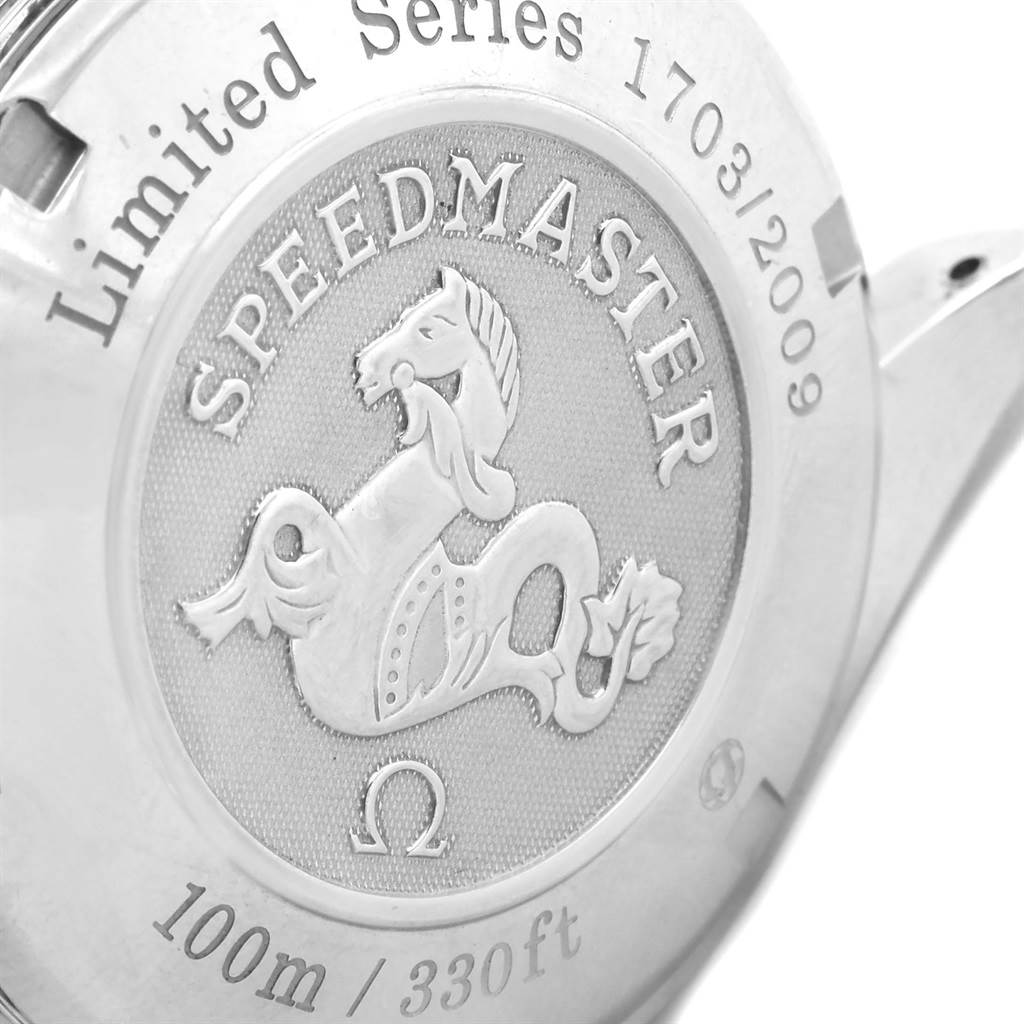 This image shows the case back of an Omega Speedmaster 323.30.40.40.01.001 Men's Stainless Steel Black Dial 323.30.40.40.01.001 Men's Stainless Steel Black Dial watch, featuring an engraved emblem and limited series information.