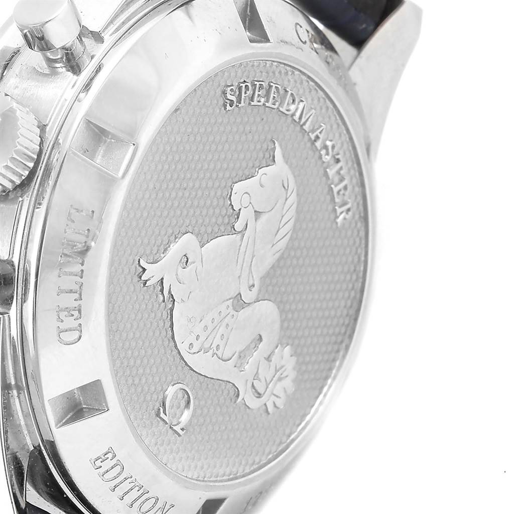 The image shows the back case of the Omega Speedmaster 311.33.40.30.02.001 Men's Stainless Steel Silver Dial 311.33.40.30.02.001 Men's Stainless Steel Silver Dial watch, featuring an engraved emblem and text.